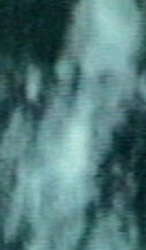 Bald_man_physical_medium_closing_his_eyes_in_transe_with_ectoplasm_in_front_of_his_mouth.jpg - Bald man physical medium closing his eyes in transe with ectoplasm in front of his mouth